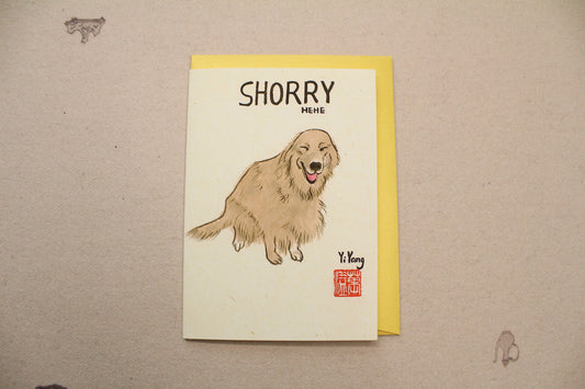 Card with a dog illustration and 'Shorry' text on a beige background